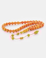 سبحة سندلس بلون أورنج بتصميم أنيق