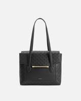 شنطة نسائية مميزة من الجلد بلون أسود