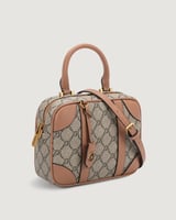 شنطة نسائية بتصميم أنيق بلون وردي