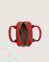 شنطة نسائية بتصميم مميز بلون أحمر