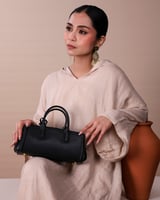 شنطة صفاء النسائية جلد بلون أسود