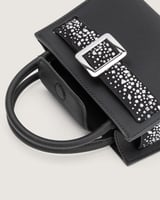 شنطة بريق النسائية جلد بلون أسود