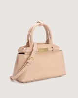 شنطة نسائية من الجلد الفاخر بلون وردي