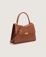 شنطة نسائية متوسطة الحجم بلون بني