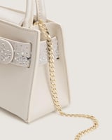 شنطة بريق النسائية جلد بلون أبيض