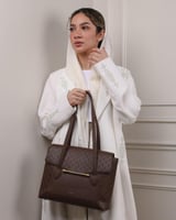 شنطة نسائية مميزة من الجلد بلون بني