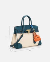 شنطة نسائية واسعة بلون أزرق وبيج