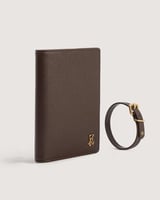 محفظة واسوارة من الجلد باللون البني