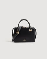 شنطة نسائية بتصميم أنيق بلون أسود