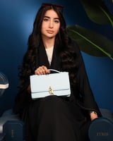 شنطة نسائية بمقاس لكل يوم بلون أزرق فاتح