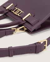 شنطة برق النسائية جلد بلون أرجواني