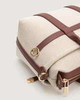 شنطة أرجوان النسائية عملية بلون بني وبيج