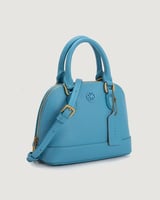 ‎ شنطة نسائية بتصميم مميز بلون أزرق