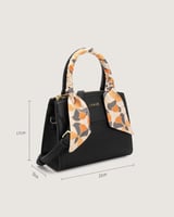 شنطة نسائية من الجلد بلون أسود