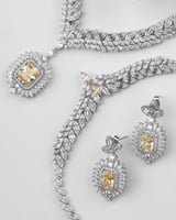 طقم اكسسوار نسائي ملكي بلون فضي وأصفر