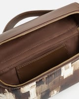 شنطة نسائية لكل يوم بلون بني