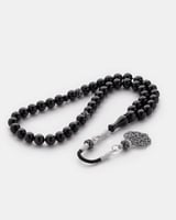 سبحة من حجر البكلايت باللون الأسود