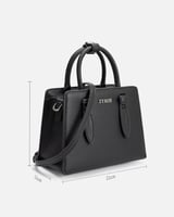 شنطة نسائية من الجلد بلون أسود