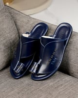 زيبرية رجالية من الجلد بلون أزرق