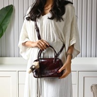 شنطة نسائي كاجول سوداء بتصميم عملي مع قفل معدني