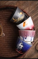 مجموعة 4 أكواب فخارية برسومات