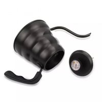 أبريق تقطير الماء مع مقياس حرارة