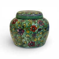 علبة مشجرة أخضر