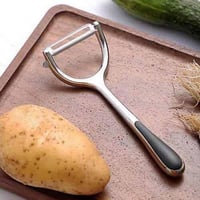 قشارة البطاطس والخضار اليدوية بمقبض وشفرة ستيل حاد...