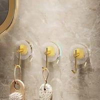 خطافات تعليق ذهبية لاصقة 3 قطع أنيقة فخمه لصالات ا...