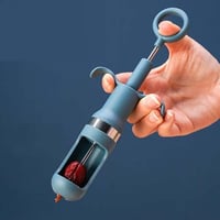 أداة إزالة نواة التمر حيث تقوم باستخلاص النواة بطر...