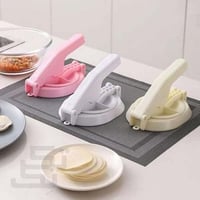 مكبس فرد العجين بلاستيك الى قطع دائرية لتحضير المع...