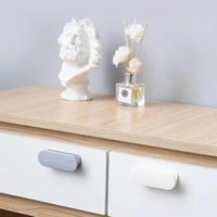 مقابض دواليب وادراج لاصقة شكل بيضاوي لون رصاصي أني...