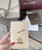 كفرين جواز سفر جلد ذهبي وبني