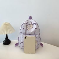 حقيبة ظهر مطبوعة على شكل فيونكة مرحة لموسم العودة...