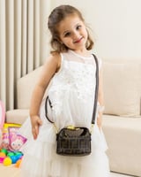 صُممت لتكون قطعة مكملة لطفلتك بحجم ميني