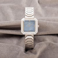 ساعه استيل باللون الفضي ميناء سماوي