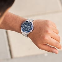 ساعة رجالية استيل باللون الفضي واطار كحلي