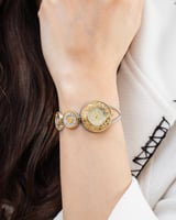 ساعة الجنيهات باللون المكس ميناء ذهبي