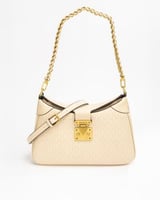 شنطة باللون البيج حجم وسط