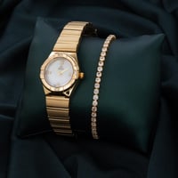 طقم ساعة وإسواره أنيق باللون الذهبي