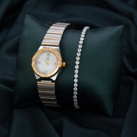 طقم ساعة وإسواره أنيق باللون الفضي والذهبي