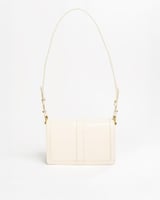 شنطة باللون البيج حجم صغير