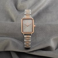 ساعة نسائية باللونين الفضي والنحاسي