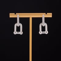 حلق نسائي على شكل حلقات متتابعه متادخله بفصوص زركو...