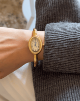 ساعة الاناقة فصوص ذهبي