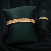 طقم اسوارة وخاتم باللون الذهبي