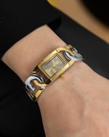 ساعة بتصميم حلقات مترابطة باللون المكس ميناء رصاصي