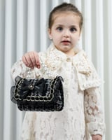 صُممت لتكون قطعة مكملة لطفلتك بحجم ميني