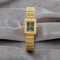 ساعه استيل باللون الذهببي