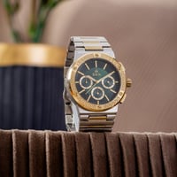 ساعة ستيل باللون الذهبي و الفضي أخضر